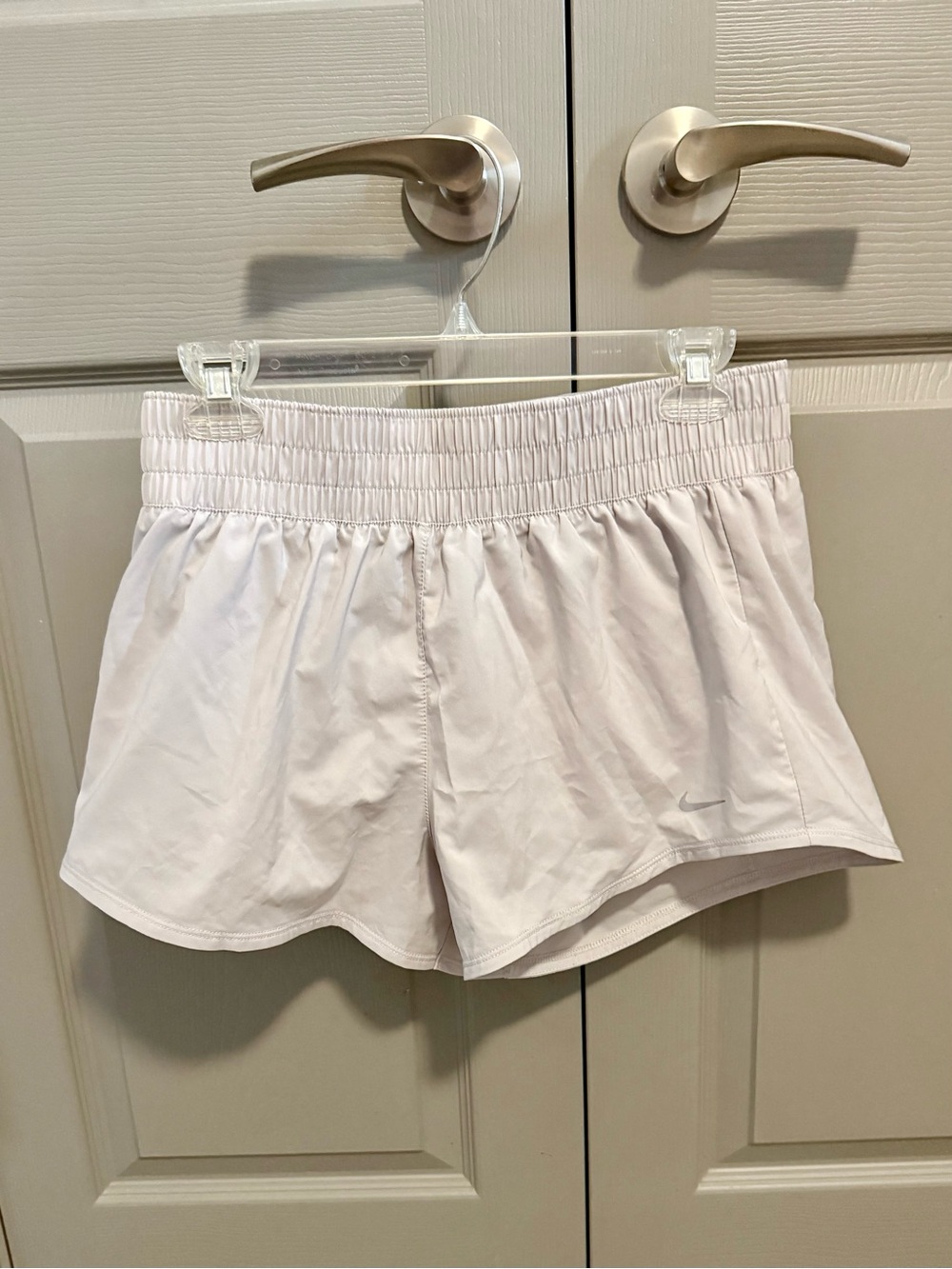 Nike High-Waisted Dri-FIT Shorts in light gray, Medium